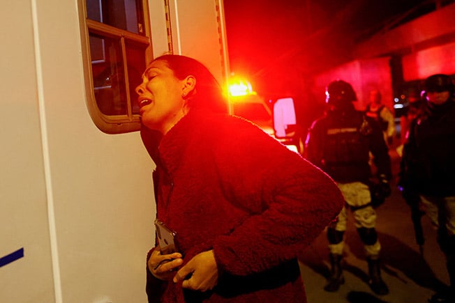image Mexican prosecutors investigating murder in deadly fire at migrant center (Update)