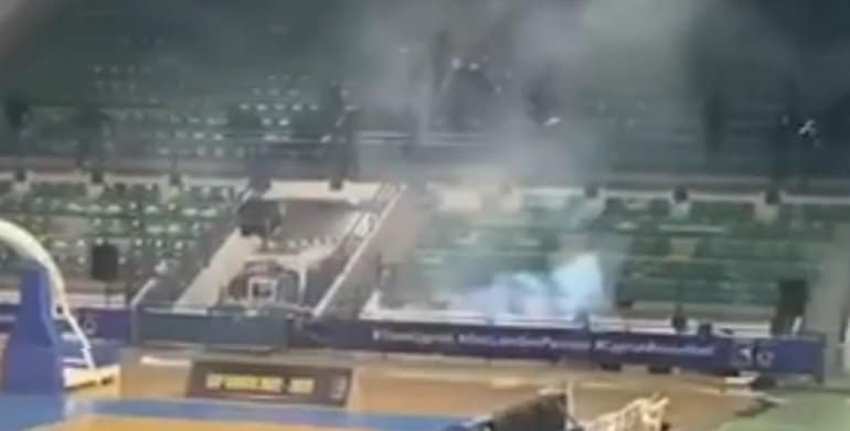 image Rioting fans at basketball match set fire to offices and bus stop