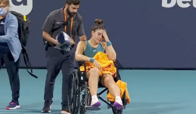 image Andreescu leaves court in wheelchair, Tsitsipas into Miami last 16