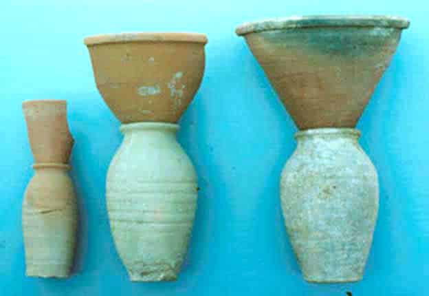 feature iole clay funnels and vases for separating molasses from sugar loaves