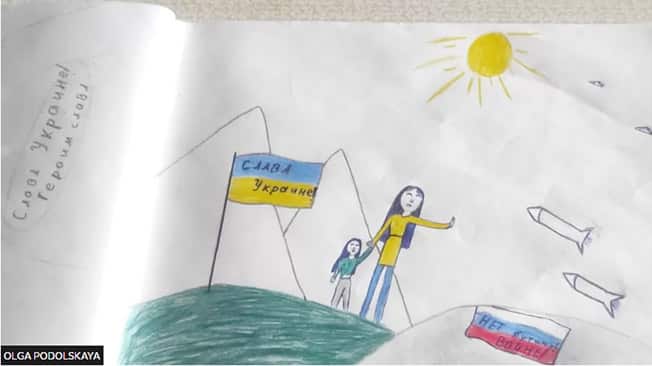 image Russian father whose daughter drew anti-war picture given two years&#8217; jail but flees