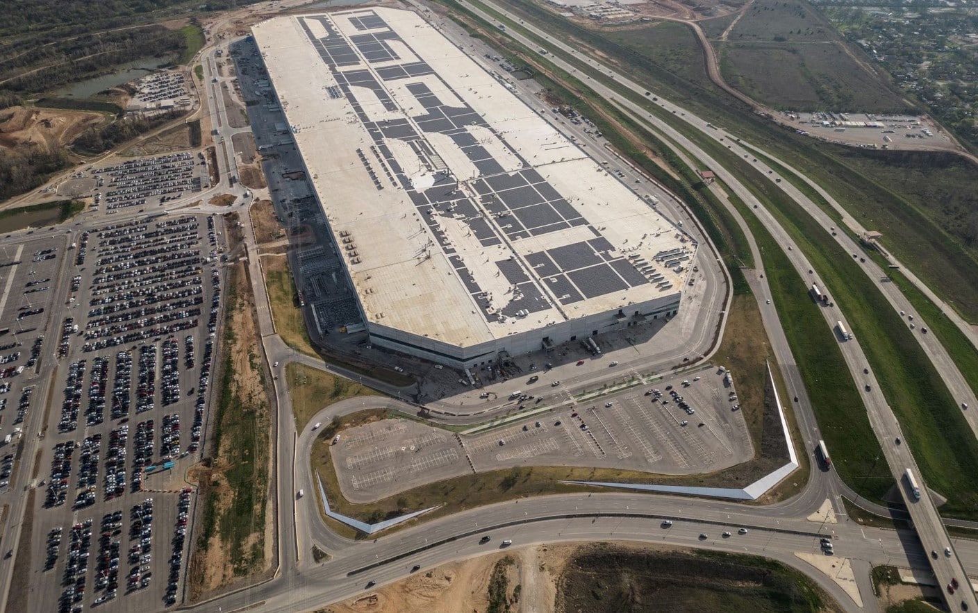 image Tesla vows to halve EV production costs, Musk keeps affordable car plan under wraps