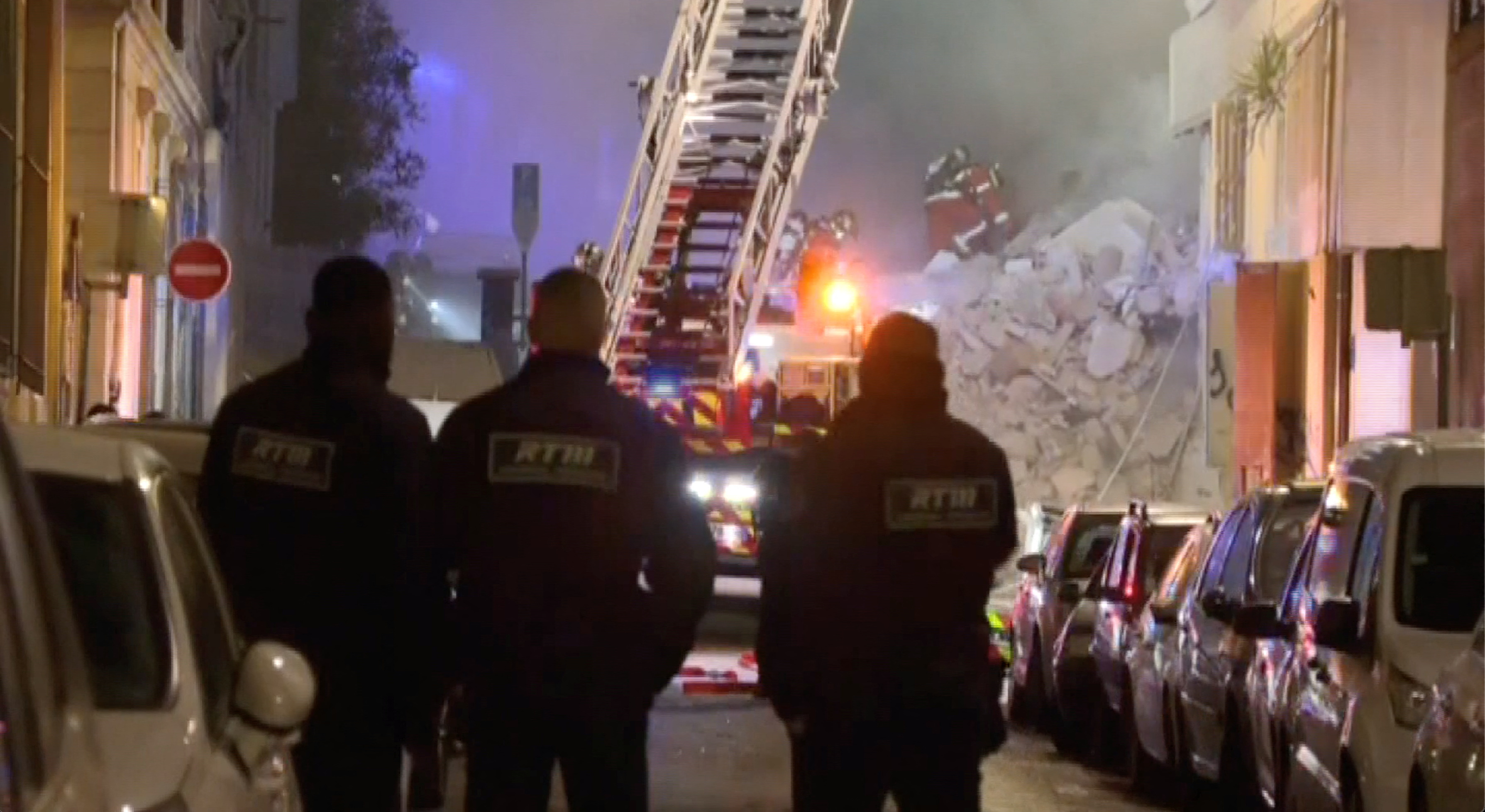 image French rescue workers recover two bodies from rubble of collapsed buildings
