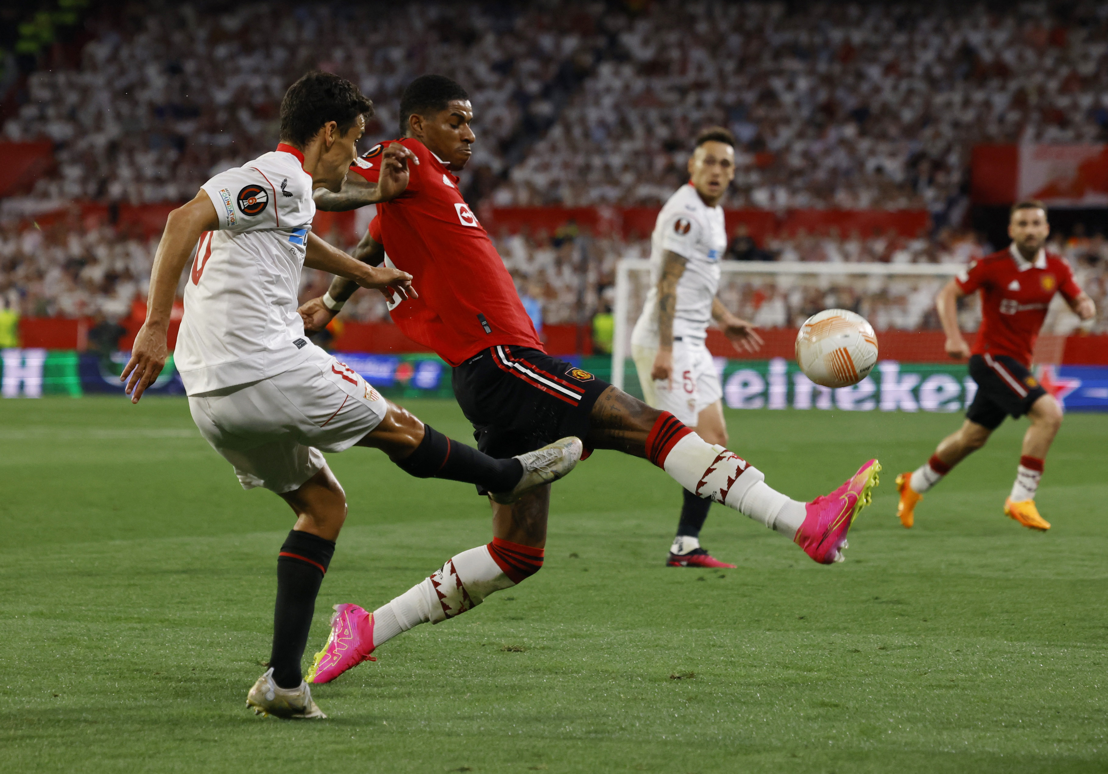 image Slick Sevilla punish slapdash Man United to ease into Europa semis,