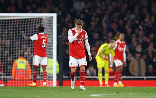 image Arsenal stage late escape to snatch 3-3 draw, but title hopes hit