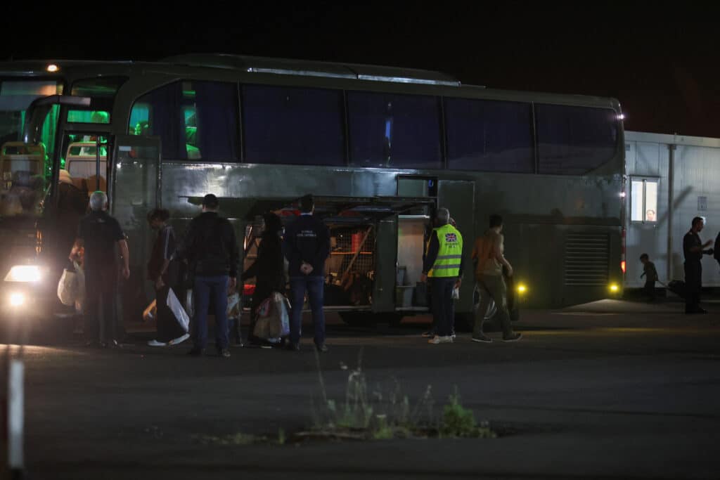 british nationals, who have been evacuated from sudan, arrive at the larnaca international airport, in larnaca