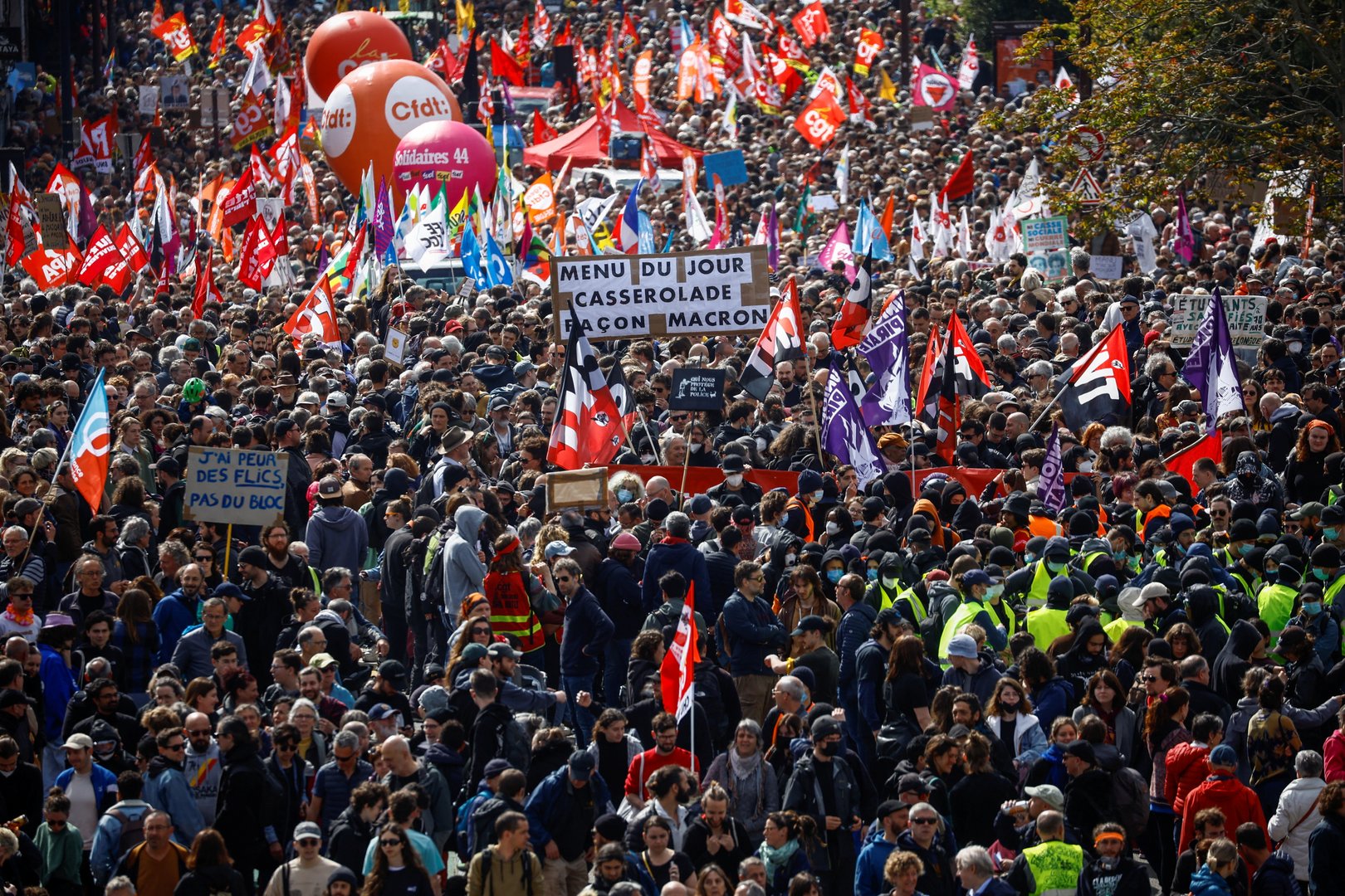 image Paris police fire tear gas as French march against pension reform (Updated)