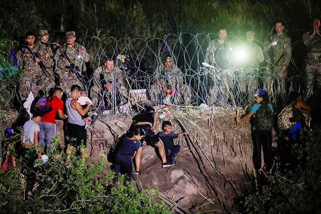image Uncertainty clouds US transition at Mexico border as new rules take effect