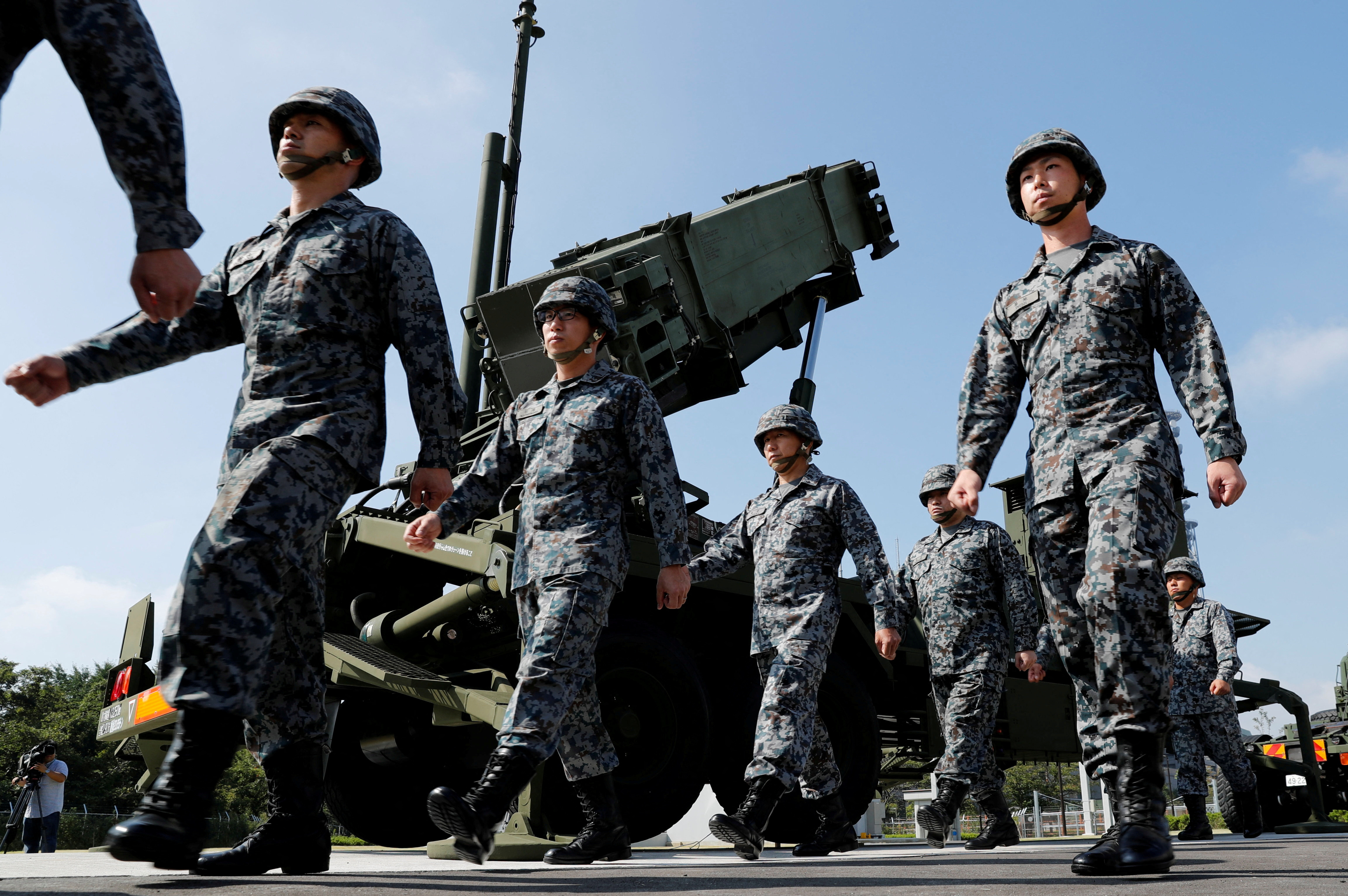 image Japan puts missile defences on alert as North Korea warns of satellite launch (Updated)