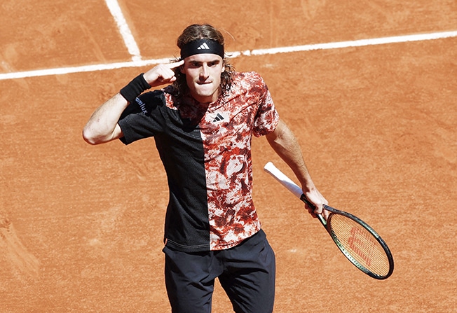 image Tsitsipas powers past Carballes Baena into third round