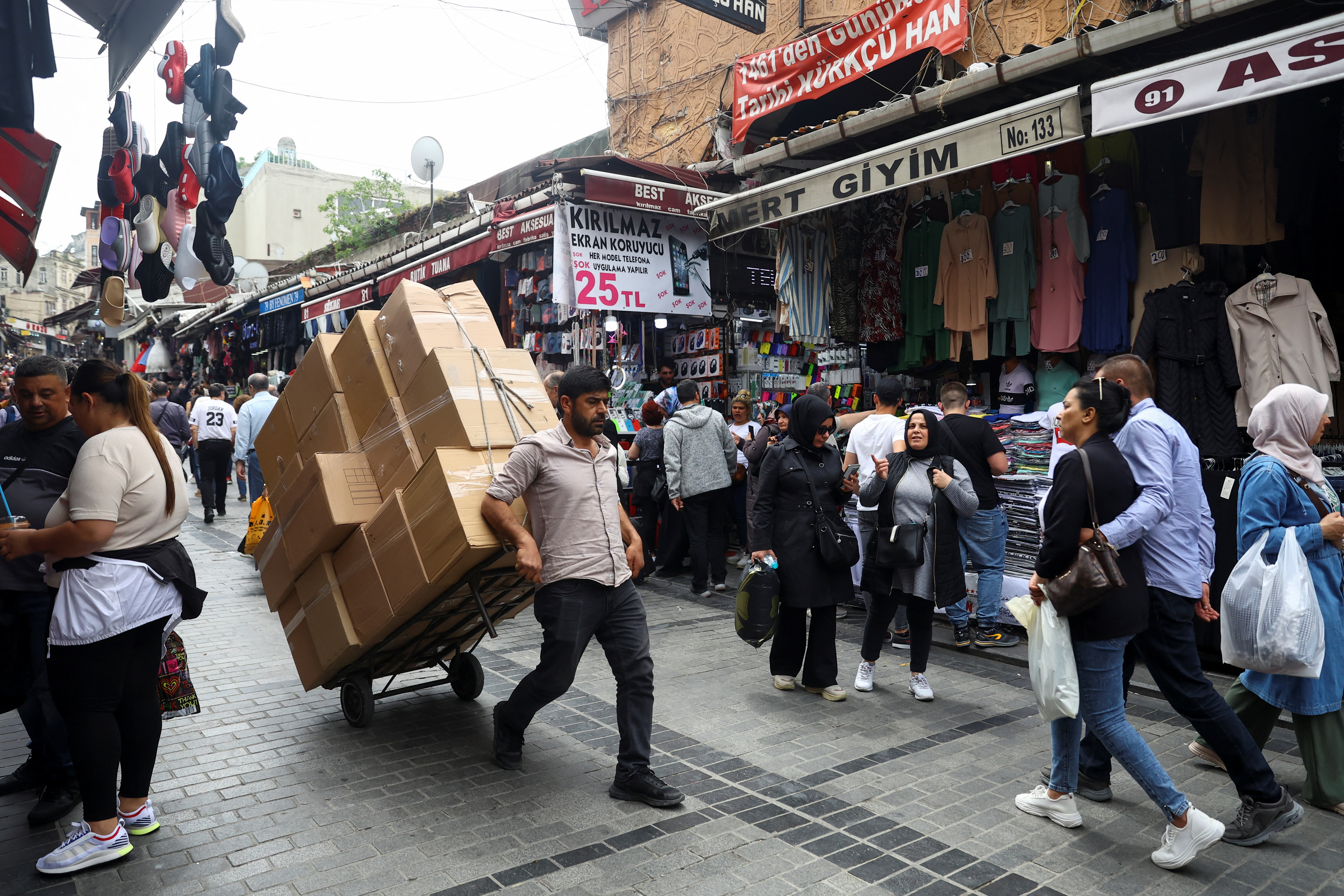 image Erdogan party split on economic plan as Turkey runoff looms