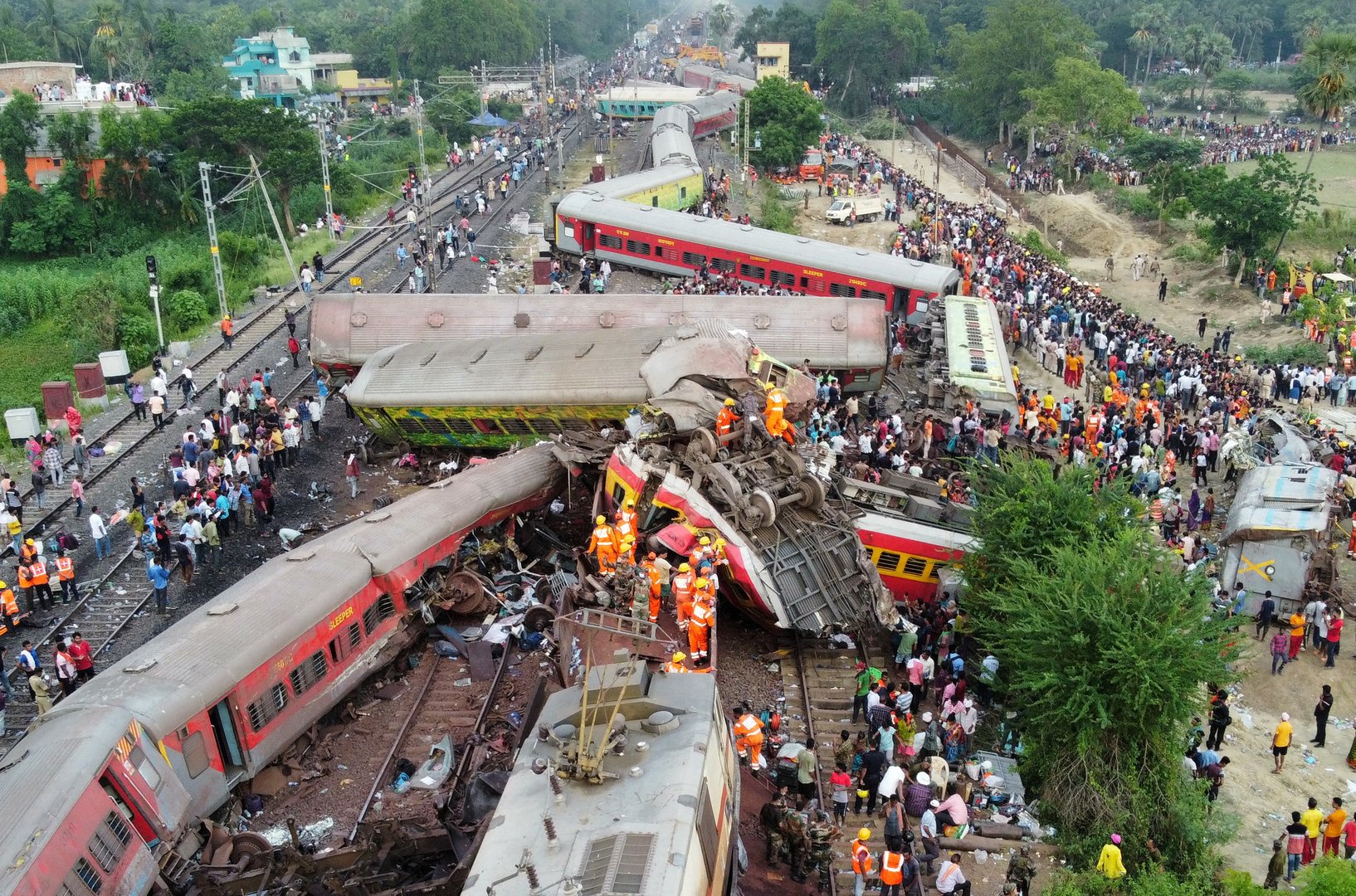 image India investigates rail disaster as trains crawl through crash site (Updated)