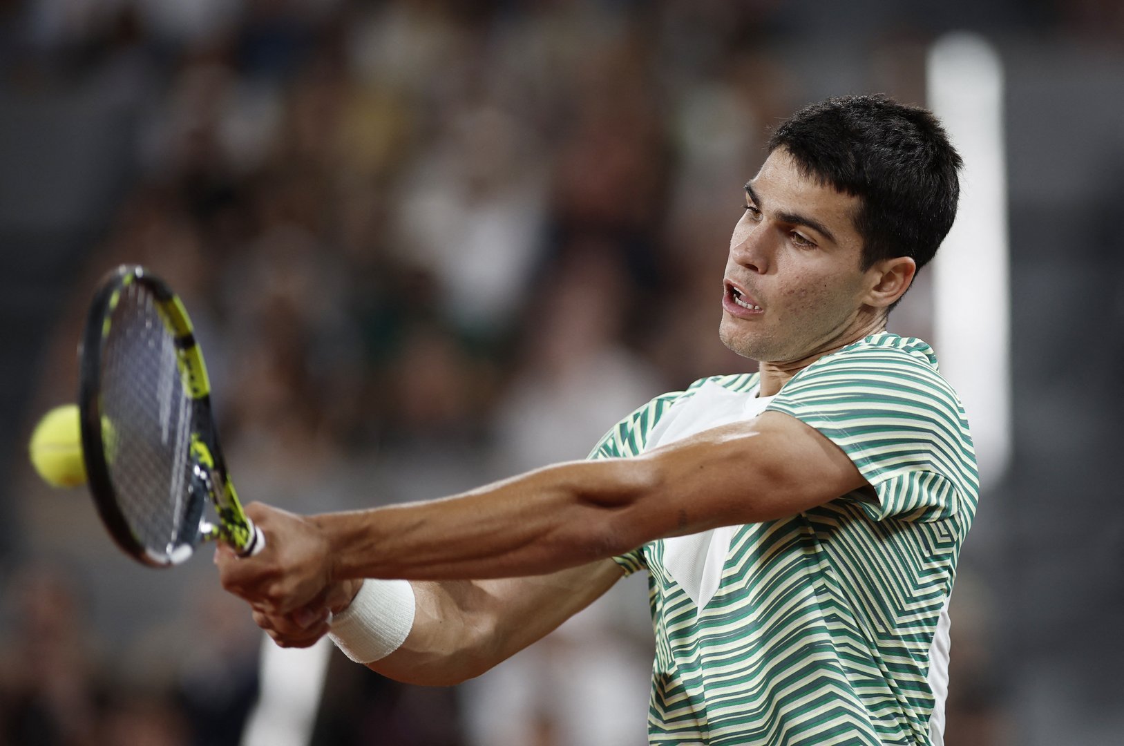 image Top seed Alcaraz hunts down Tsitsipas to set up Djokovic showdown
