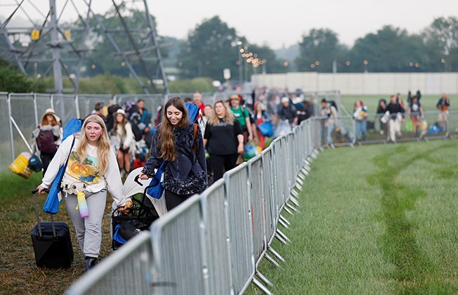 image Elated music fans pitch up for Glastonbury