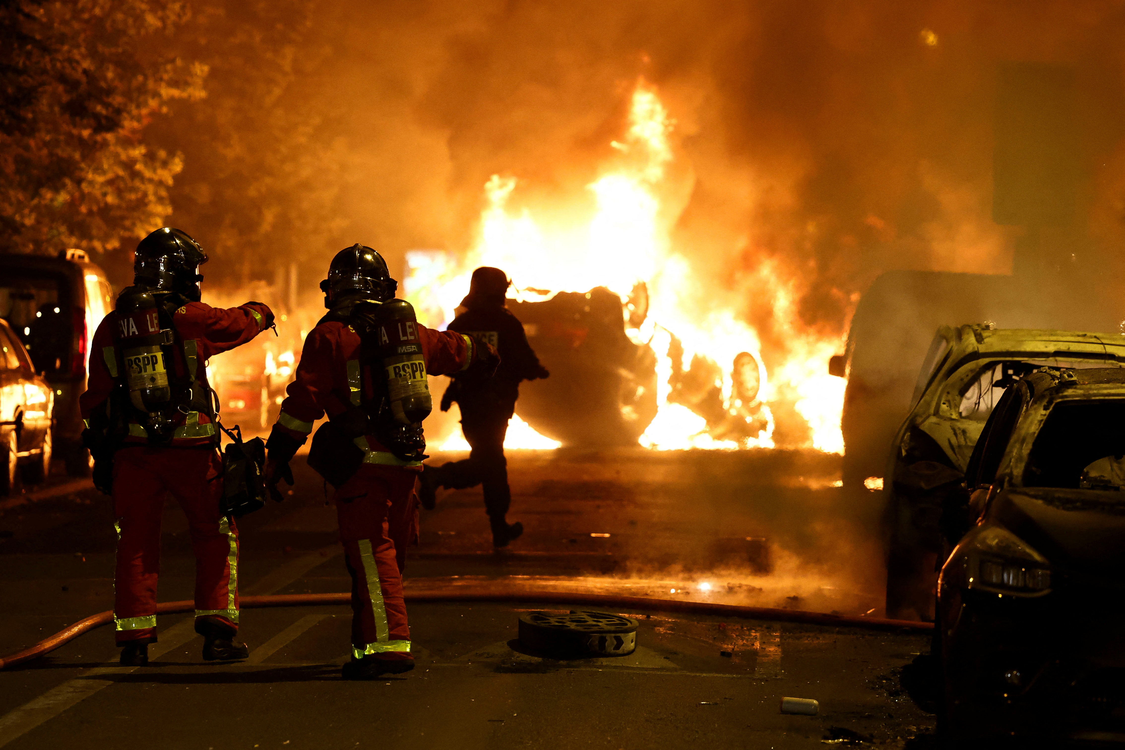 image France&#8217;s Macron halts trip over riots, as family buries teenager