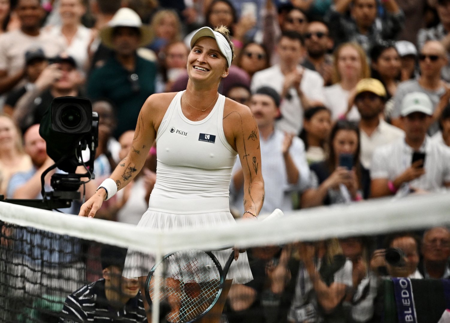 image Vondrousova comes through roller-coaster clash with Pegula to reach semis