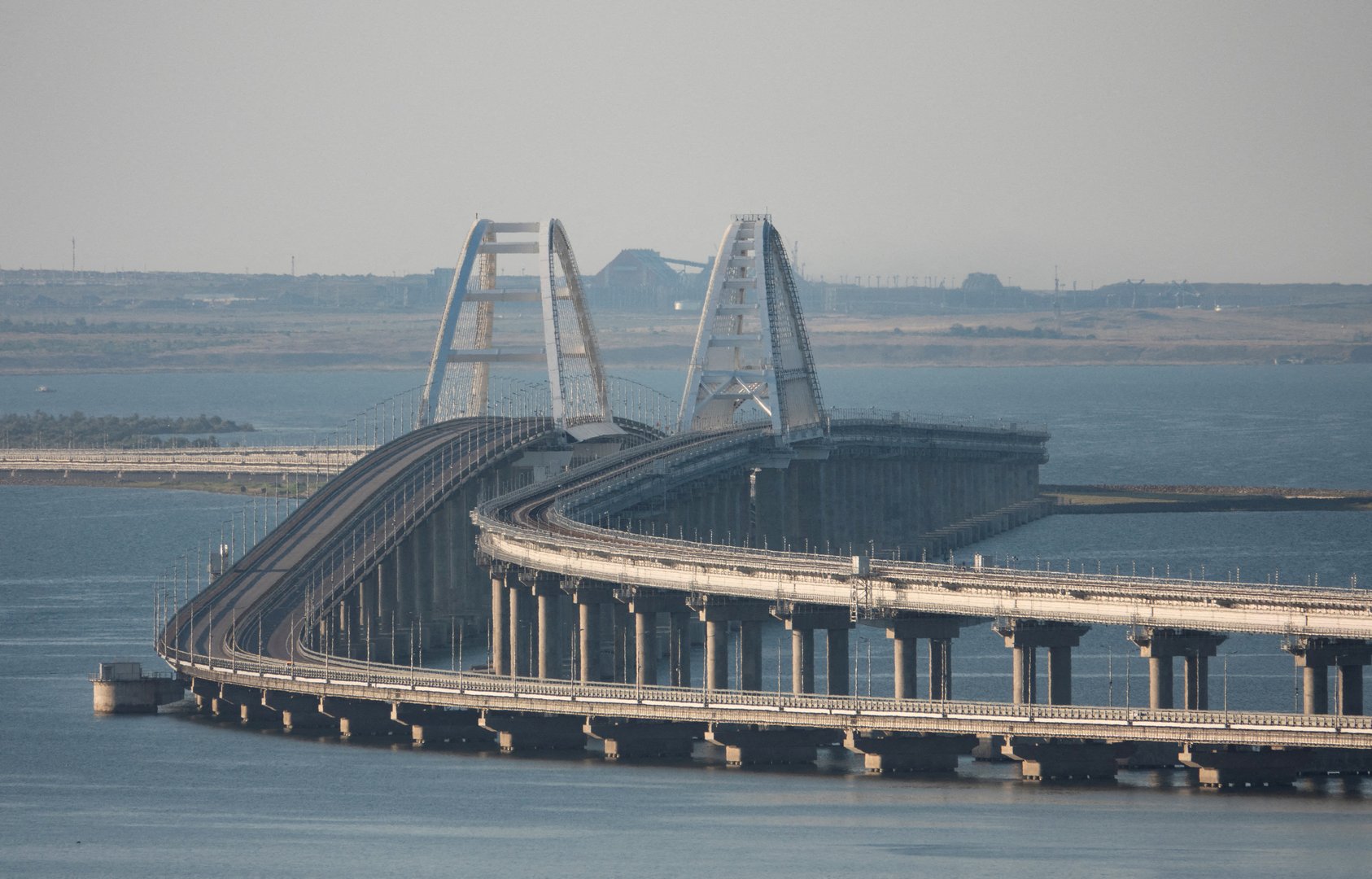 image Blasts on Crimea Bridge kill two, threaten Russian war supply lines