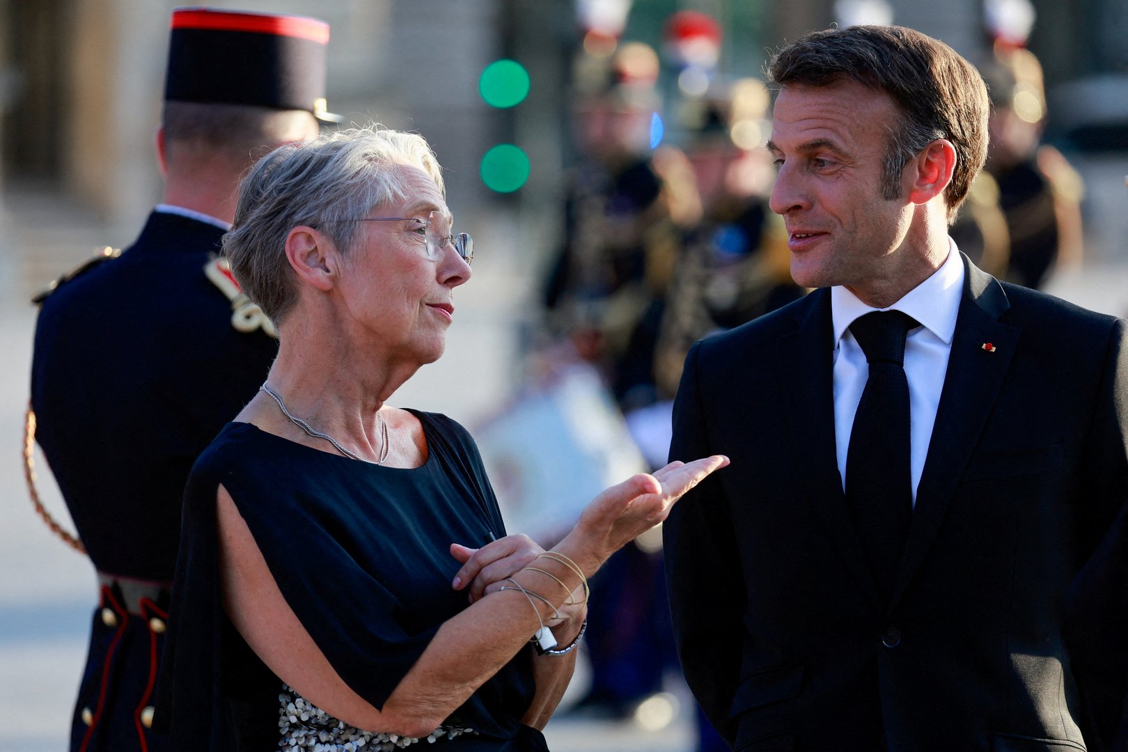 image Macron decides to keep French PM in role despite pension unrest, riots