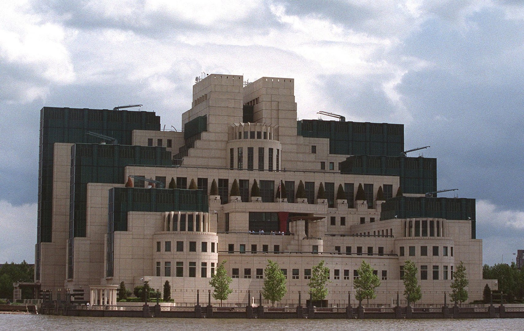 image UK&#8217;s MI6 boss says Putin under pressure, invites Russians to spy for Britain
