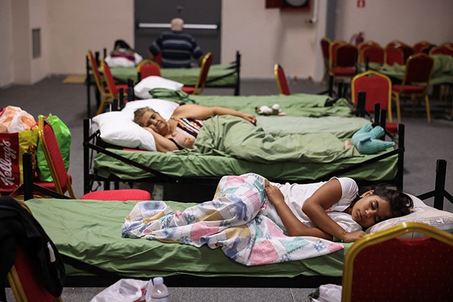 image Sailing coaches rescue 130 people stranded amid wildfire in Greece