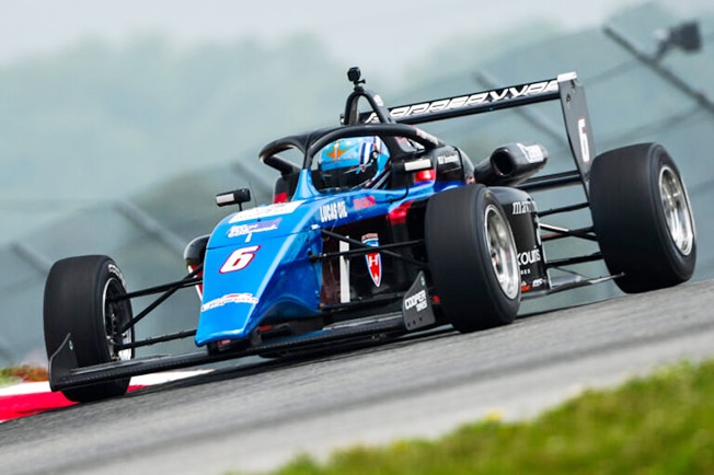 image Cypriot teenager Papasavvas wins first career race