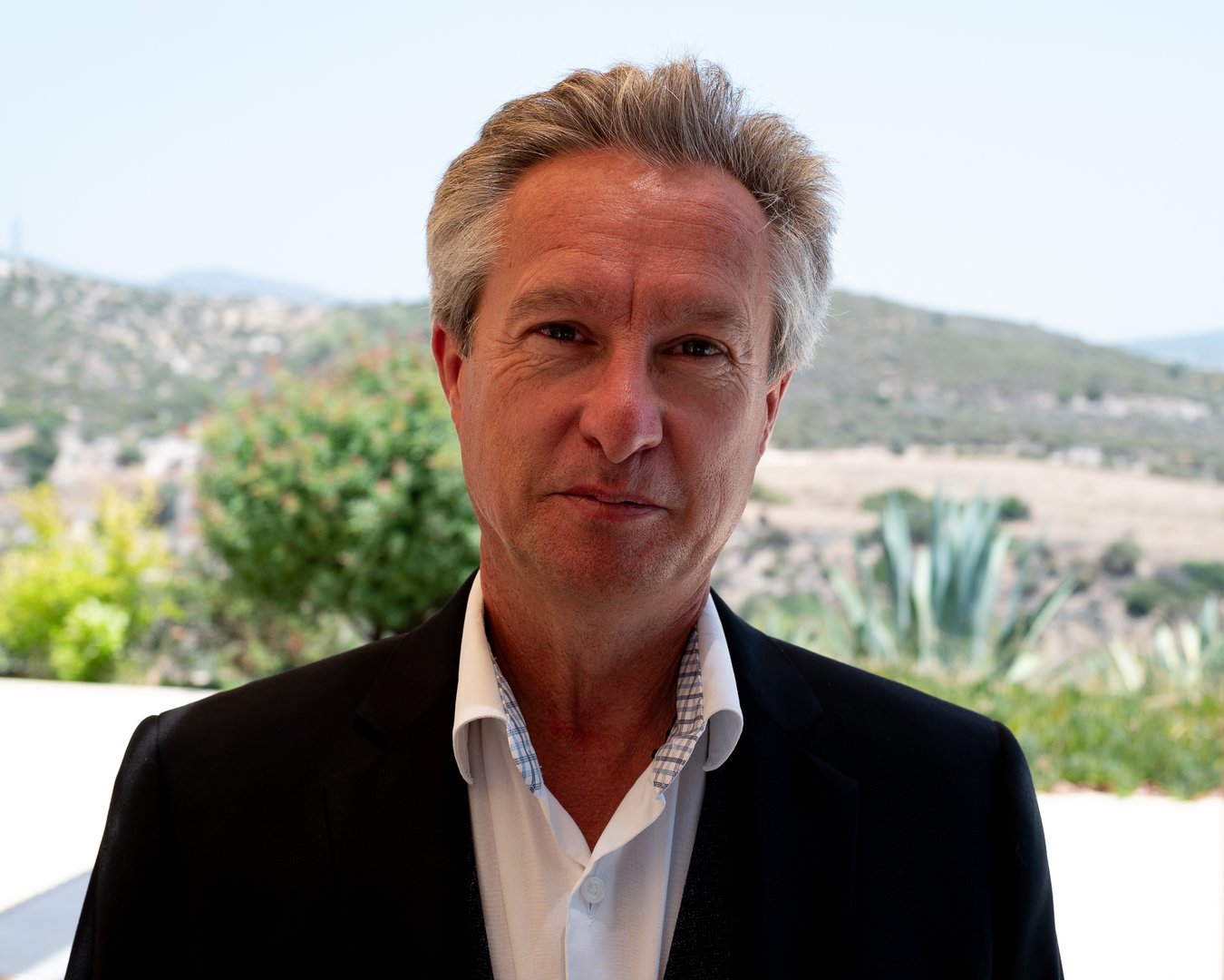 image St. John Coombes receives MBE for ‘outstanding service to the British community