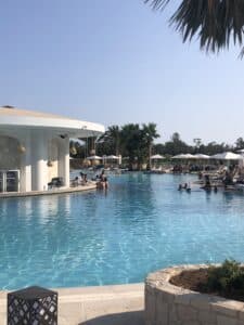 The pool with a bar at the City of Dreams Mediterranean