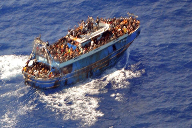 image Two remanded after almost 500 migrants arrive (updated)