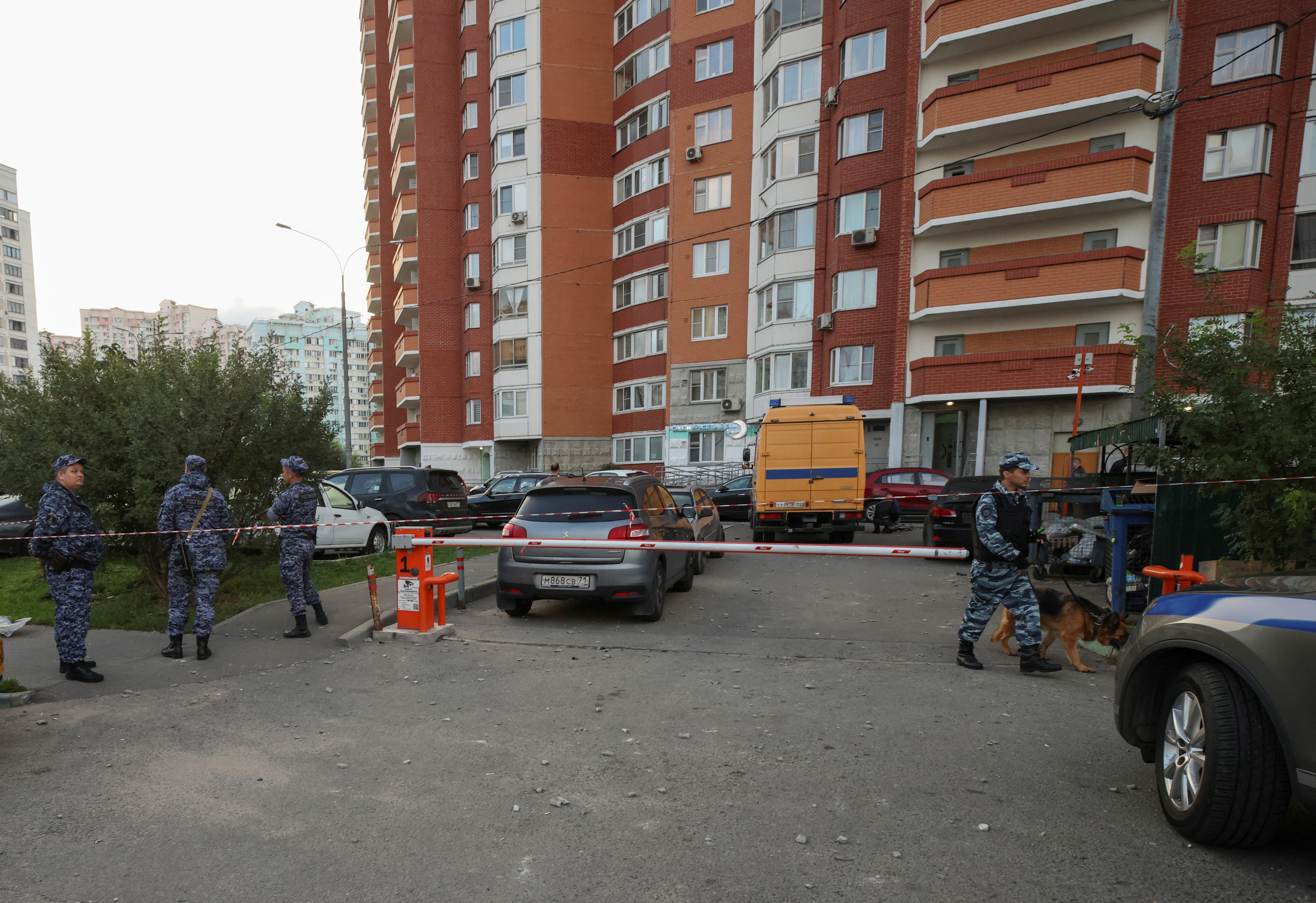 image Ukrainian drone hits apartments, cars in town near Moscow, says Russia