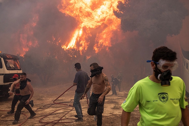 image Scorched Europe battles deadly fires, Turkey shuts shipping lane