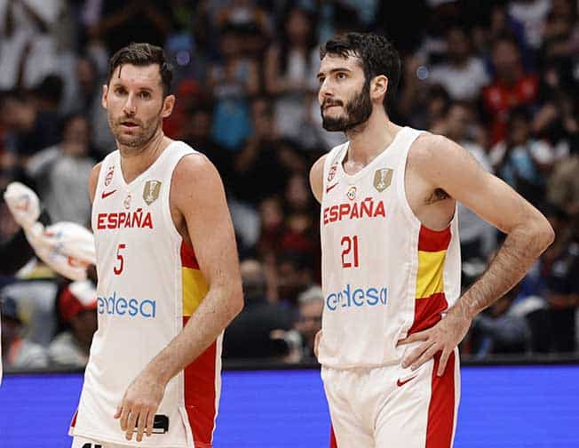 image Spain knocked out of World Cup, Lithuania spring surprise over US