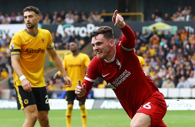 image Liverpool go top with late 3-1 win at Wolves