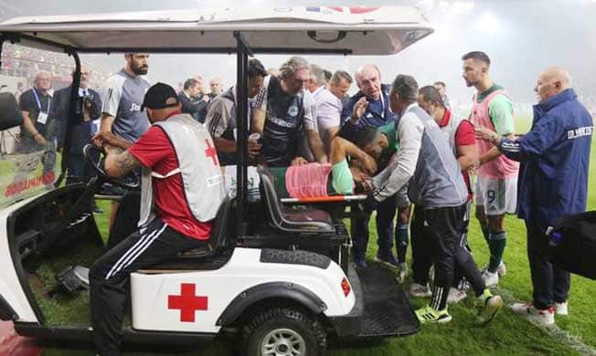 image Greek Super League match abandoned after player hit by firework