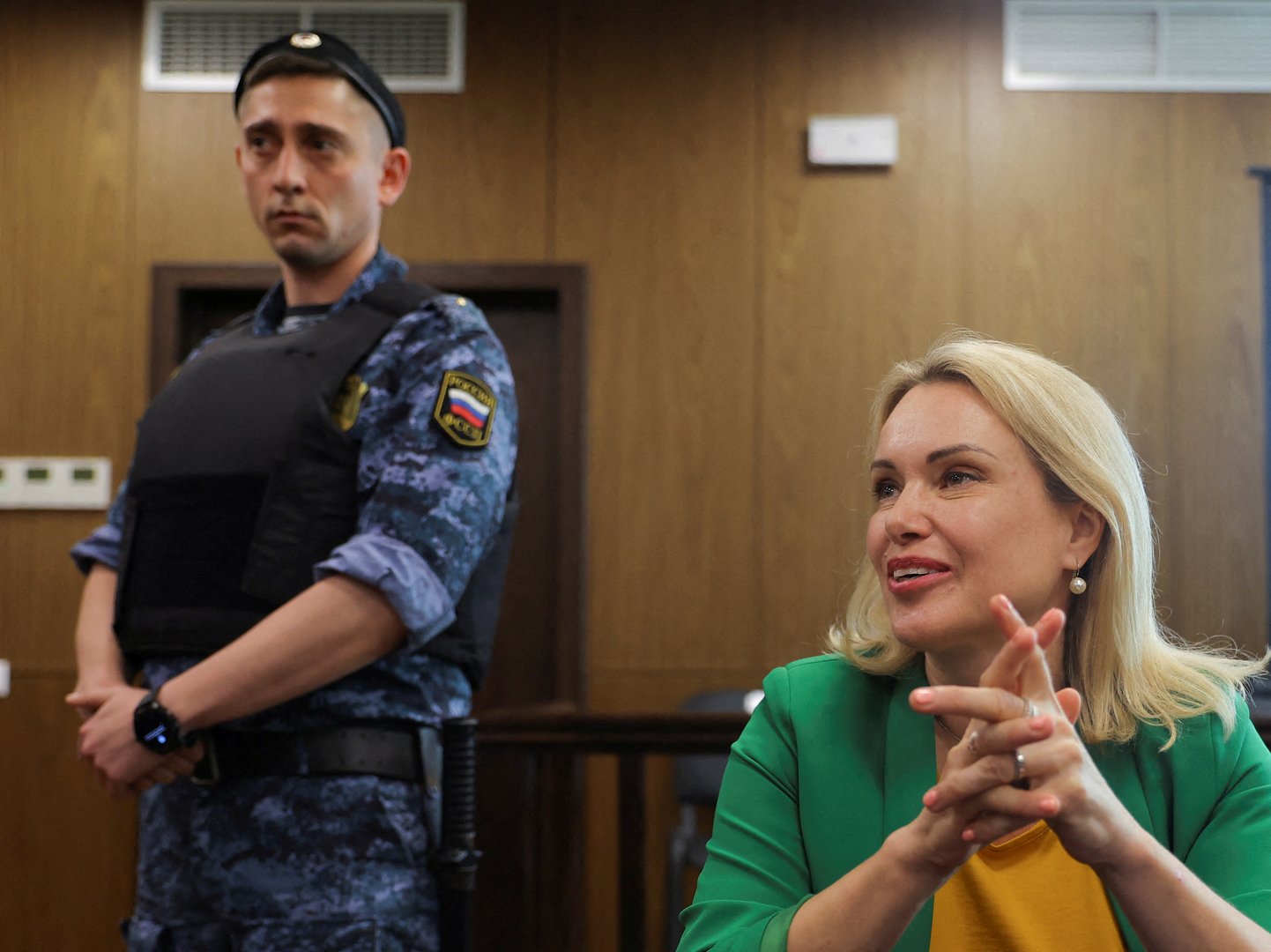 image Russian prosecutors want to jail fugitive TV journalist for 9-1/2 years
