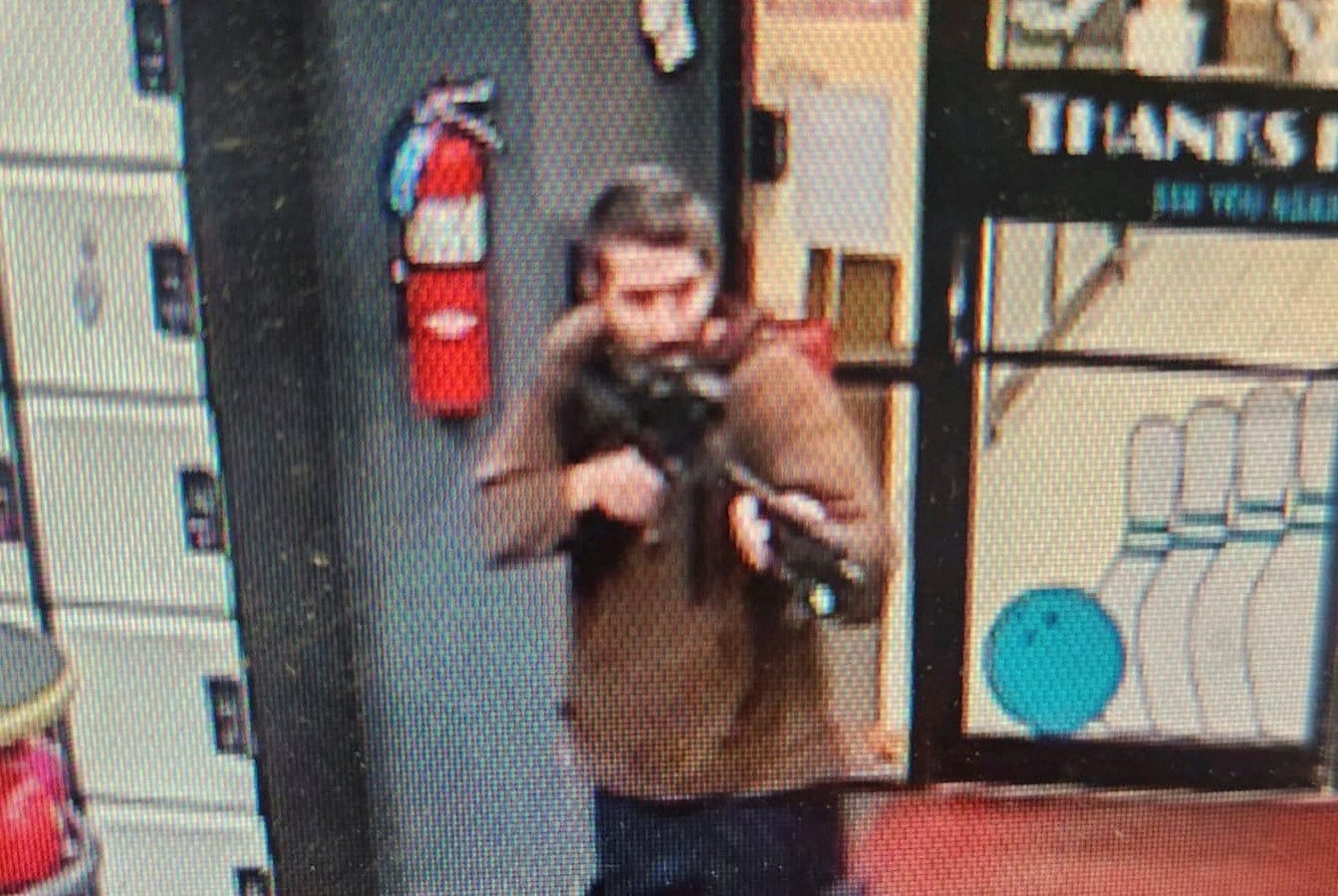 image Police scour Maine for man sought in Lewiston mass shootings (Update)