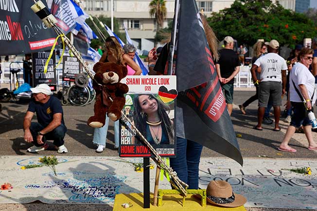 image Israeli woman snatched by Hamas at music festival is dead