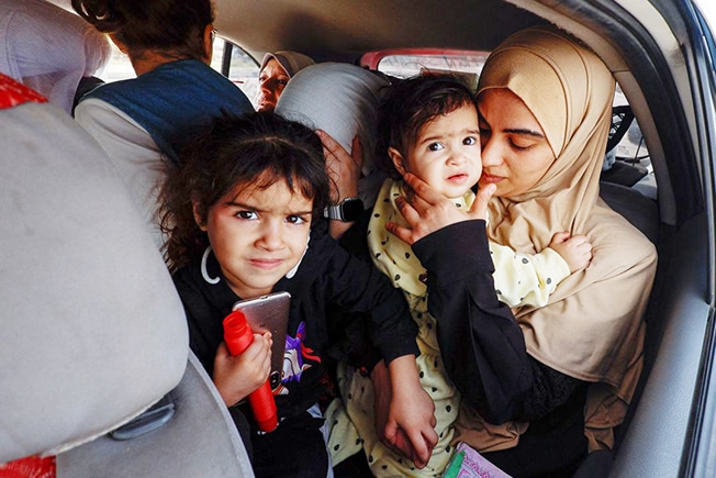 image Gaza families ordered south return home, say nowhere is safe from Israeli bombs