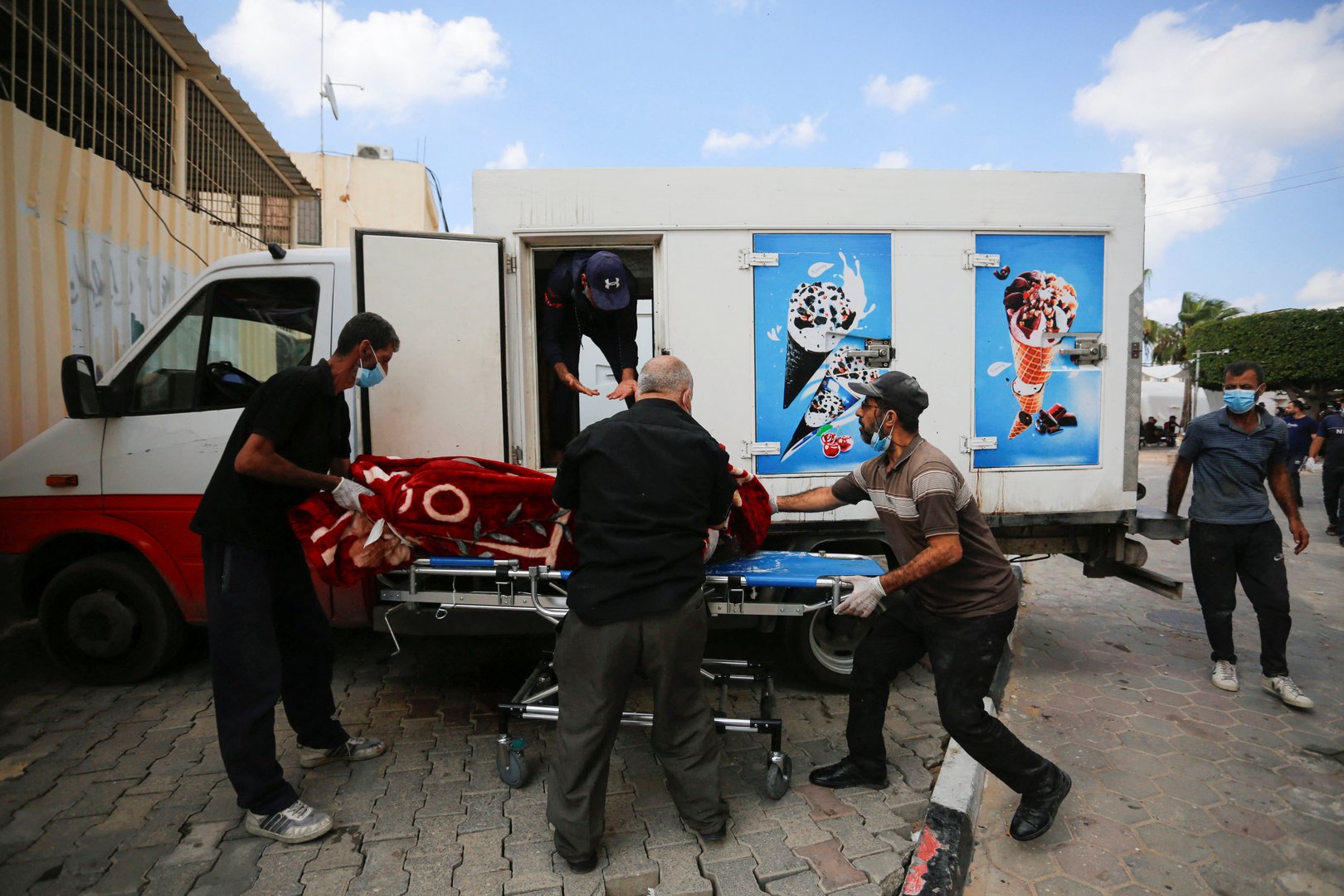 image As Gaza death toll rises, bodies are stored in ice cream trucks