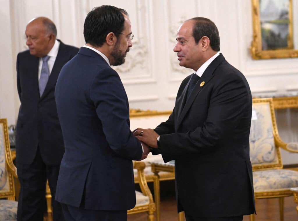 egyptian president abdel fattah al sisi greets cypriot president nikos christodoulides during the cairo international summit for peace in the middle east in cairo