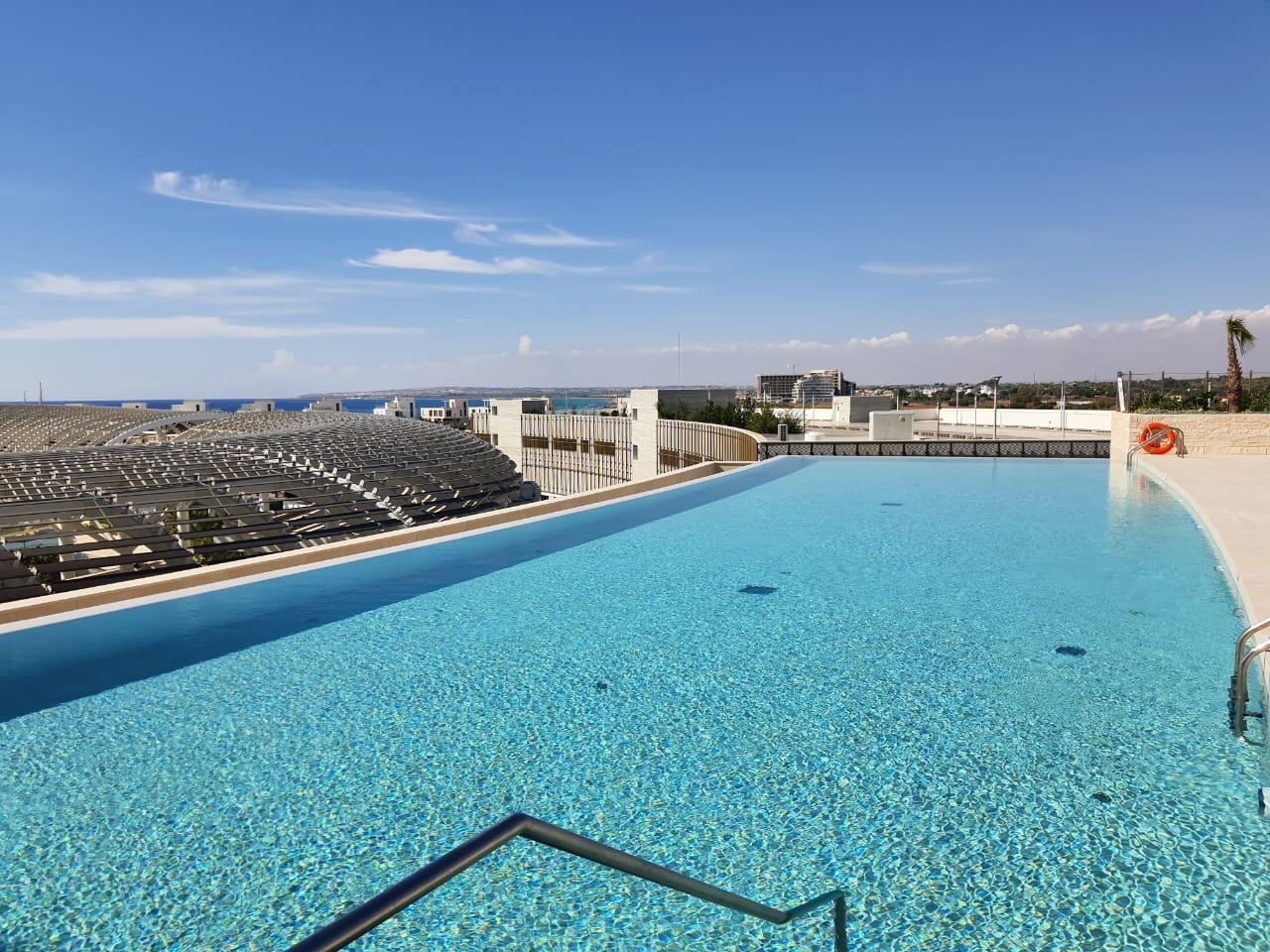 feature napa tower an infinity swimming pool overlooking the boatyard