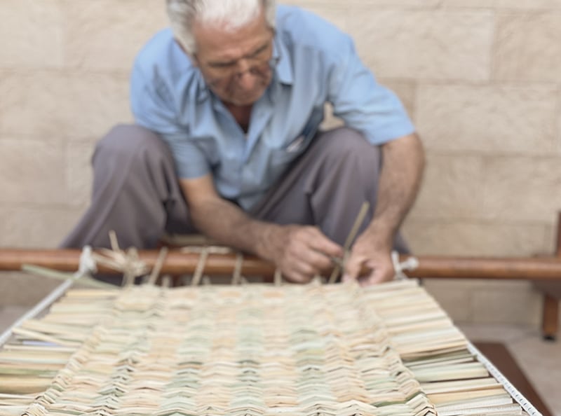 feature3 weaving artisan charalambos making the floudi straw mat