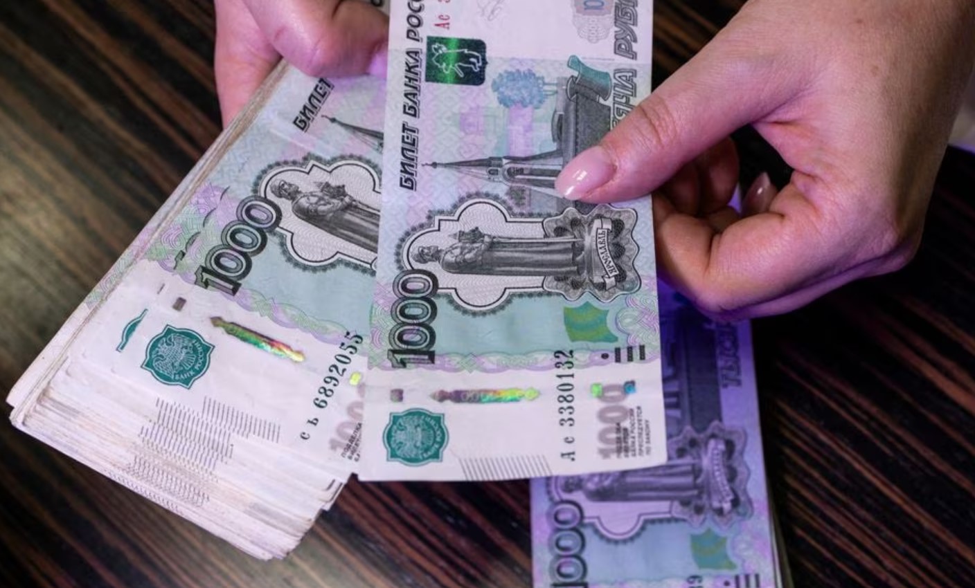 image Russian rouble dives back towards over 18-month low vs dollar