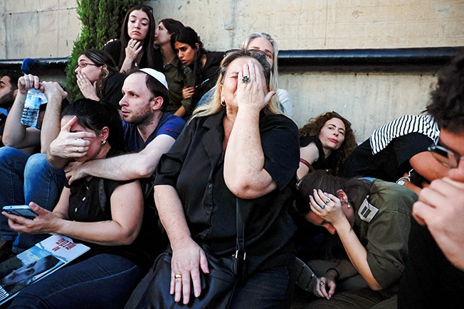 image Hamas fires rockets deep into Israel, setting off sirens in Tel Aviv