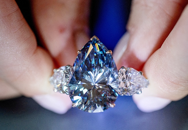 image Vivid blue diamond sells for nearly $44m at Christie&#8217;s auction