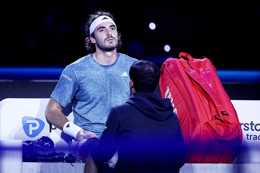 image Tsitsipas quits with injury against Rune at ATP Finals