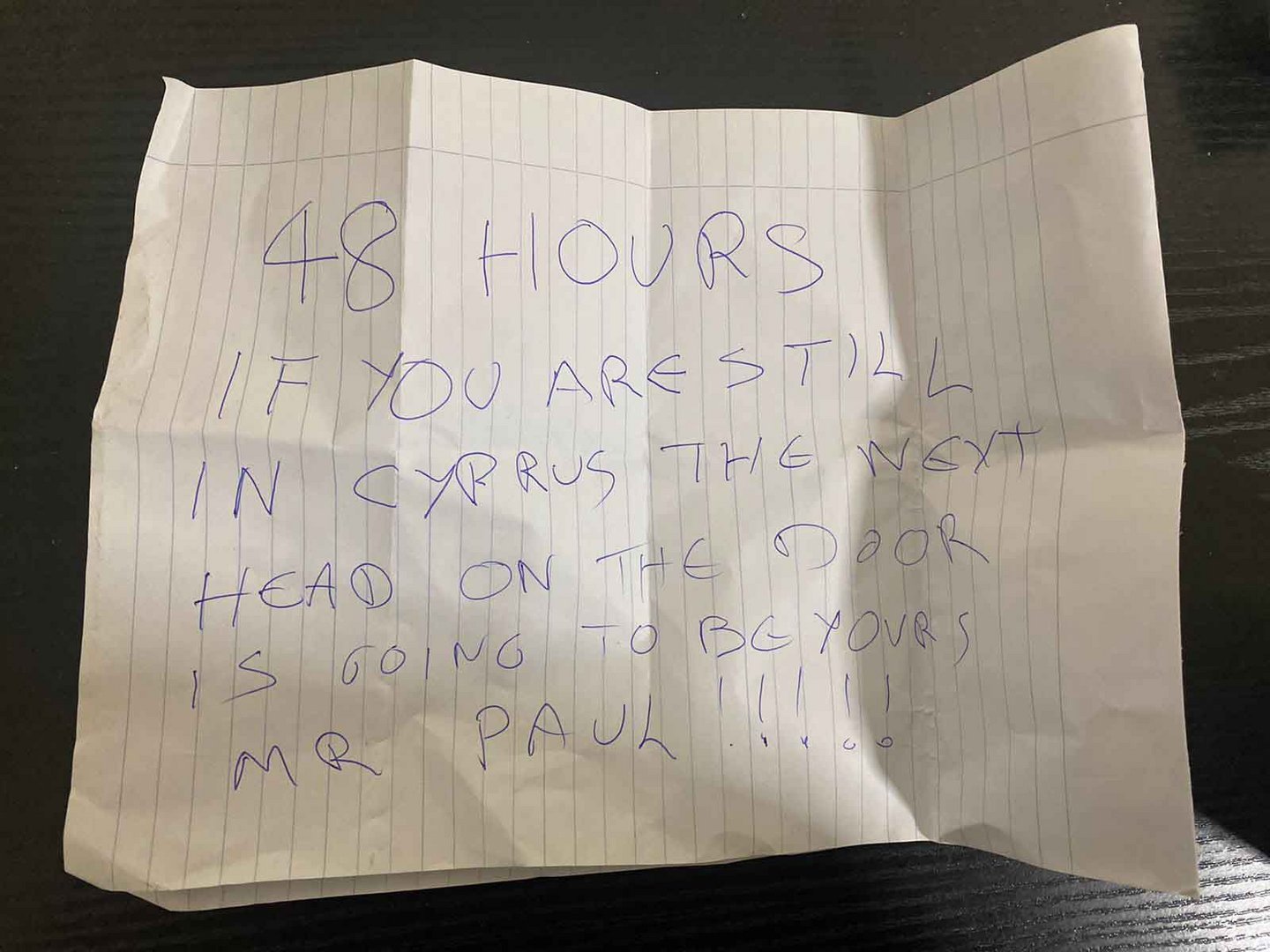 image Gruesome threatening note attached to man’s door