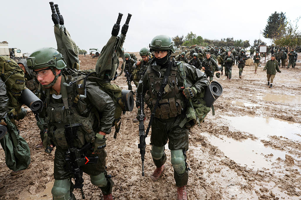 image Israeli hostages killed in Gaza were holding white flag, official says