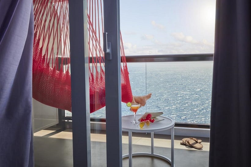 Legs in a hammock on a terrace onboard Scarlet Lady. Photoshoot of Vitamin Sea activities by Melanie Acevedo onboard Scarlet Lady, Virgin Voyages Photoshoot of Vitamin Sea activities by Melanie Acevedo onboard Scarlet Lady, Virgin Voyages Vitamin Sea & Project Jackson Photoshoot Cabins onboard SCL Shoot Date: Sept 18-25, 2021 Shoot Location: Transit from NY-Bimini Usage: Worldwide/universal unlimited rights in perpetuity for all media including 3rd party usage (Virgin Brands) for all footage and images captured during the shoot. Excluding TV + Broadcast. Talent Usage: 5 Years Worldwide/universal unlimited rights in perpetuity for all media including 3rd party usage for all footage and images captured during the shoot. Excluding TV + Broadcast. TEAM Photographers: Lifestyle: Melanie Acevedo Cabins: Sang An Agent: Kenna Zimmer, Sarah Laird & Good Company https://sarahlaird.com CD: Christian Schrader Art Buyer / Producer: Kathy Boos