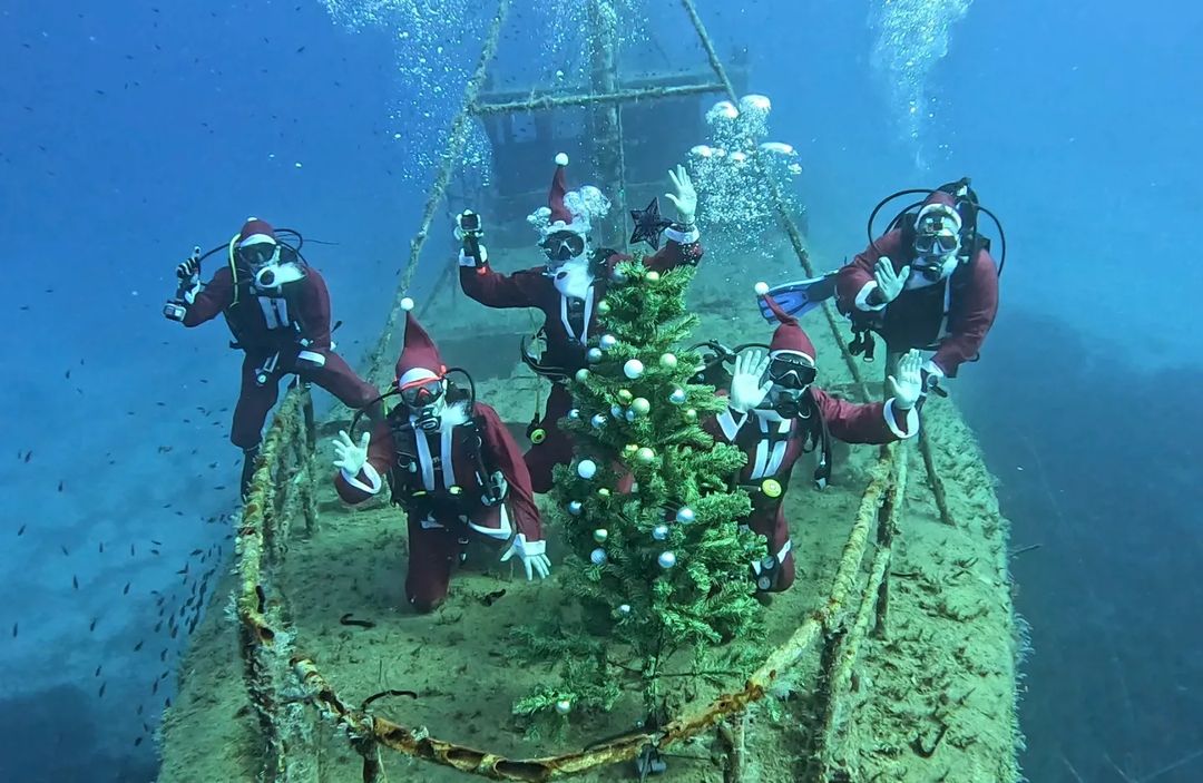 image Underwater Santas celebrate Christmas tradition at Nemesis shipwreck