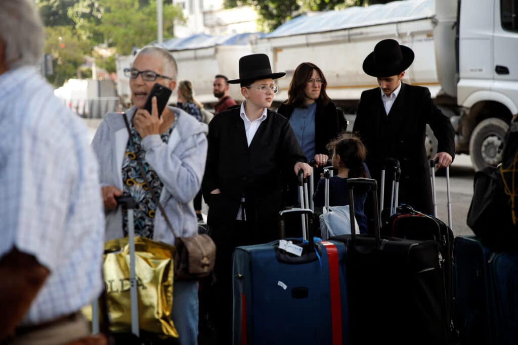 u.s. nationals and their immediate family members wait before leaving israel on a ship headed for cyprus, amid the ongoing conflict between israel and the palestinian islamist group hamas, in haifa